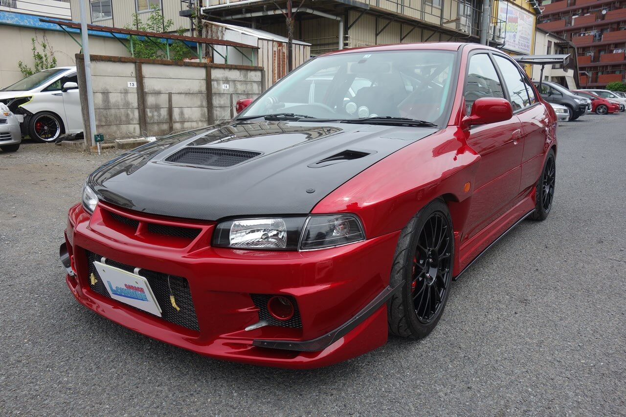 三菱 ランサー サーキッド用車両 汎用品カナード サイドフラップ加工 塗装 取り付け 東京都青梅市よりご来店のお客様です 東京 立川 板金塗装 車の傷 へこみ修理 ガレージローライド